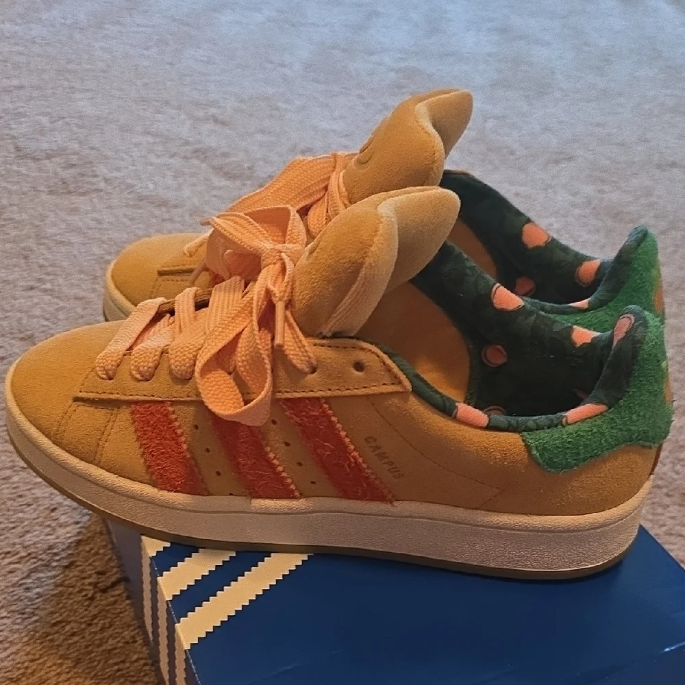 adidas Suede Low-Top Sneakers in Peach with Orange Stripes